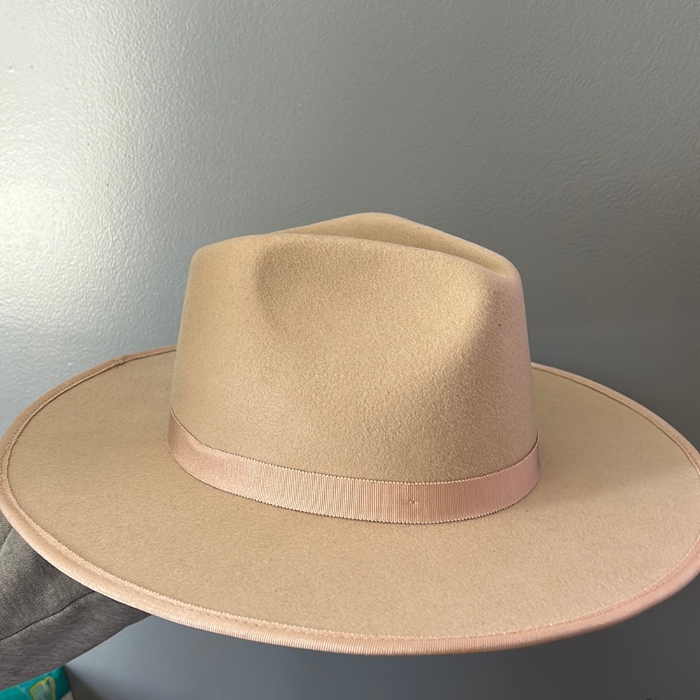 Brand new, never worn, urban outfitters, beige felt hat.